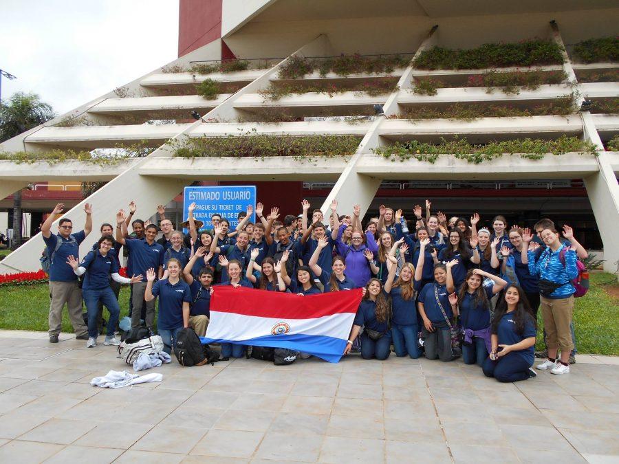Gates poses with her Paraguay chapter before they begin on their 7-week service trip.