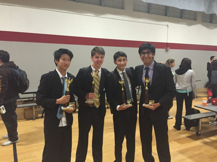 From left to right: Sophomores Andrew Shen and Matthew Hamilton and juniors Kush Dubey and Ajay Raj hold their trophies at Westmont High School after qualifying for the state tournament. 