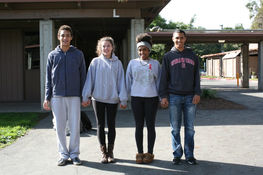 From left to right: sophomore Aldric Bianchi, junior Sofia Murray, senior Menna Mulat and senior Marek Harris hold hands to represent embracing diversity. Photo by Alexandra Ting.