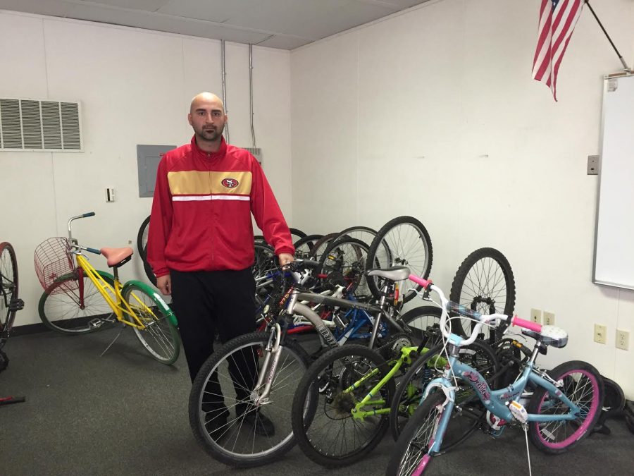 Campus supervisor, Bike Club repair bikes to donate