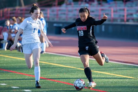 Sophomore Andrea Lu, number 19, dribbles down the field as she attempts to score against Santa Clara High School on Feb. 2, 2022. Gunn won with a final score of 6-1.