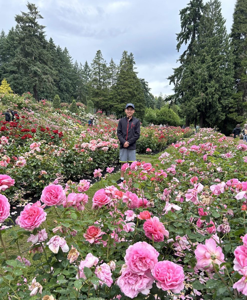 Sophomore Roy Lao visits a rose garden.