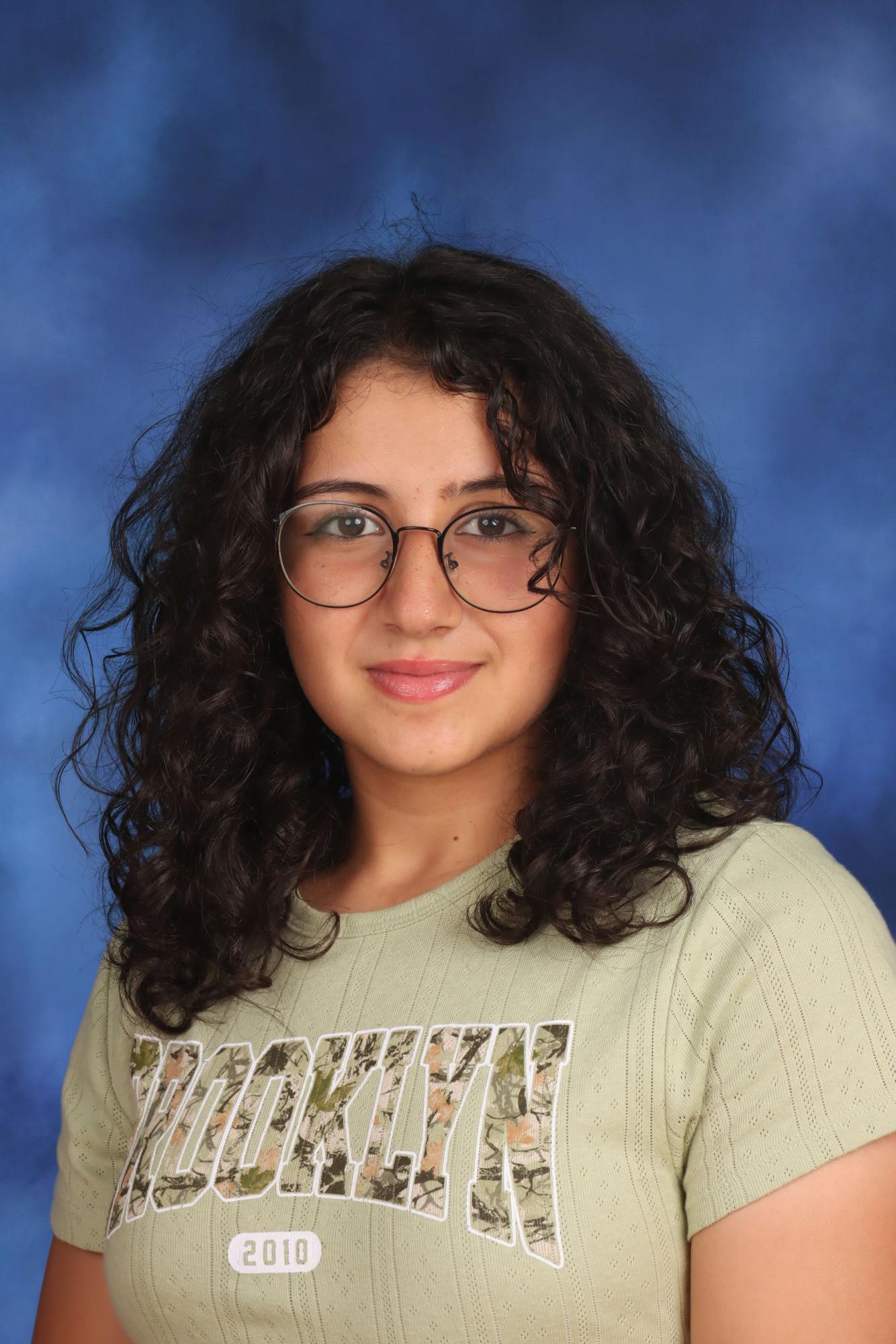 Varsity wrestler Mei Elgierari, 11